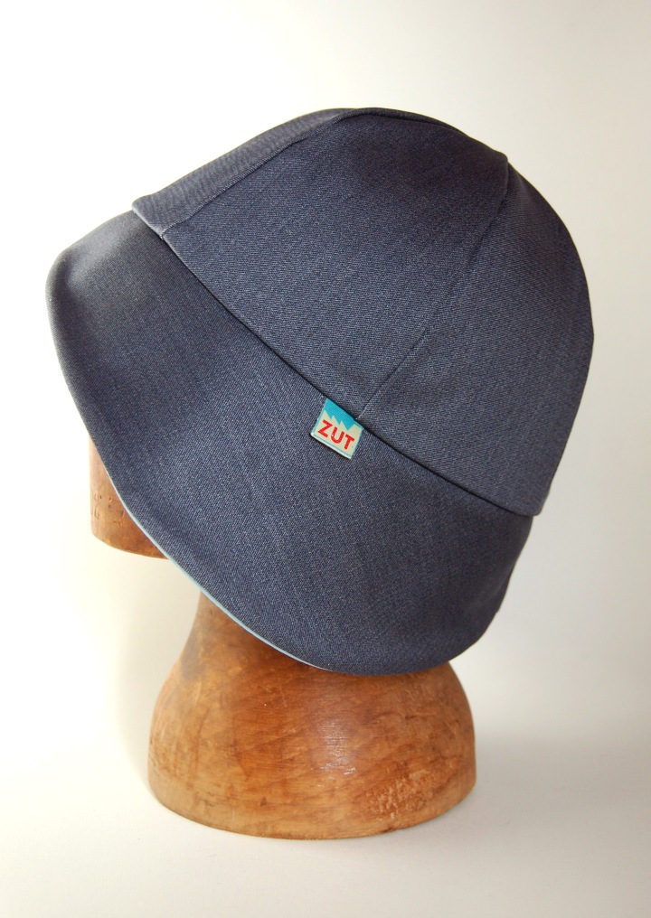 cloche rainhat with colourful leather 'underbrim'